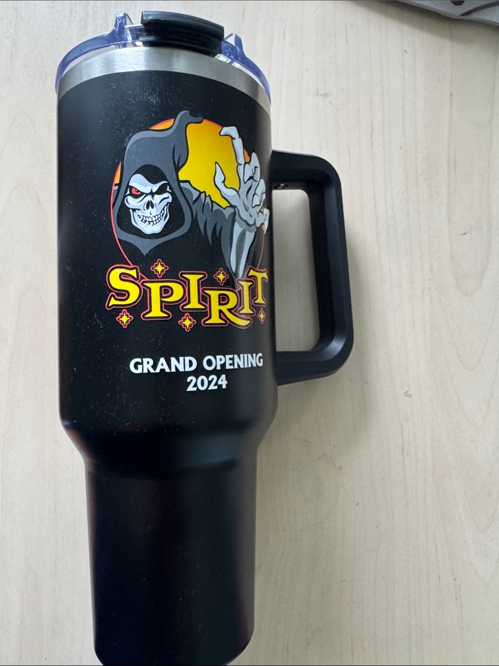 Spirit Black Travel Mug with Yellow and Red Logo